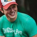 ole RED Creative Group sign Travis Denning