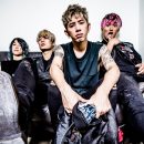 ONE OK ROCK sign Fueled By Ramen